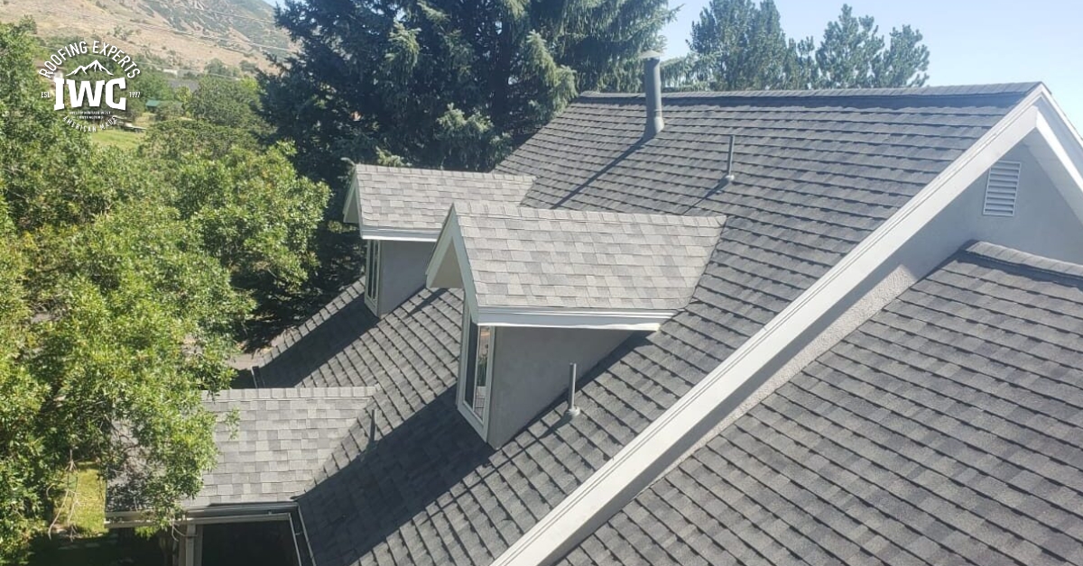 Aerial view of a newly installed roof on a modern suburban home