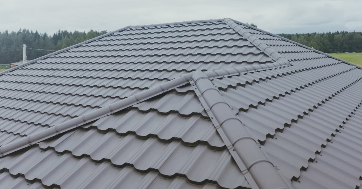 Tile roof installation on Utah home with scenic backdrop