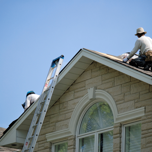 In-house roofing team working on roof replacement in West Jordan Utah